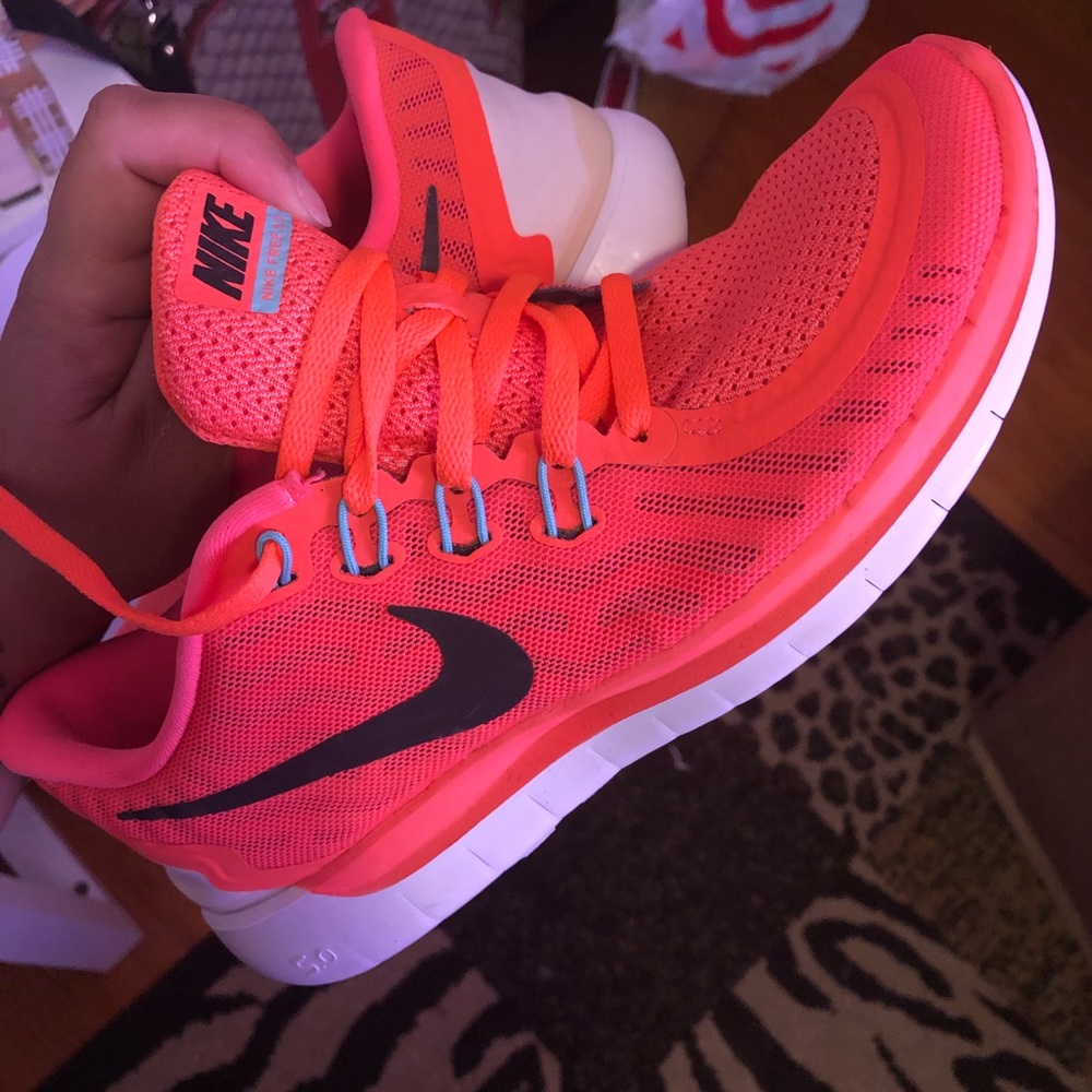 Bright neon orange Nike